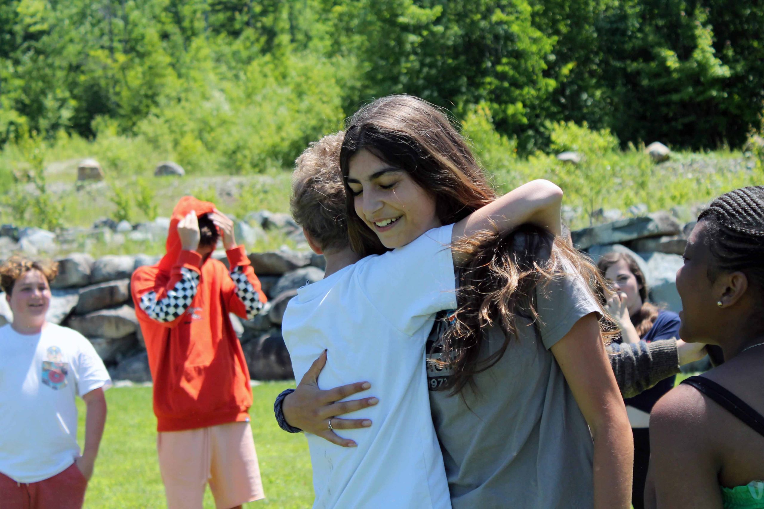 Campers hug after a competition