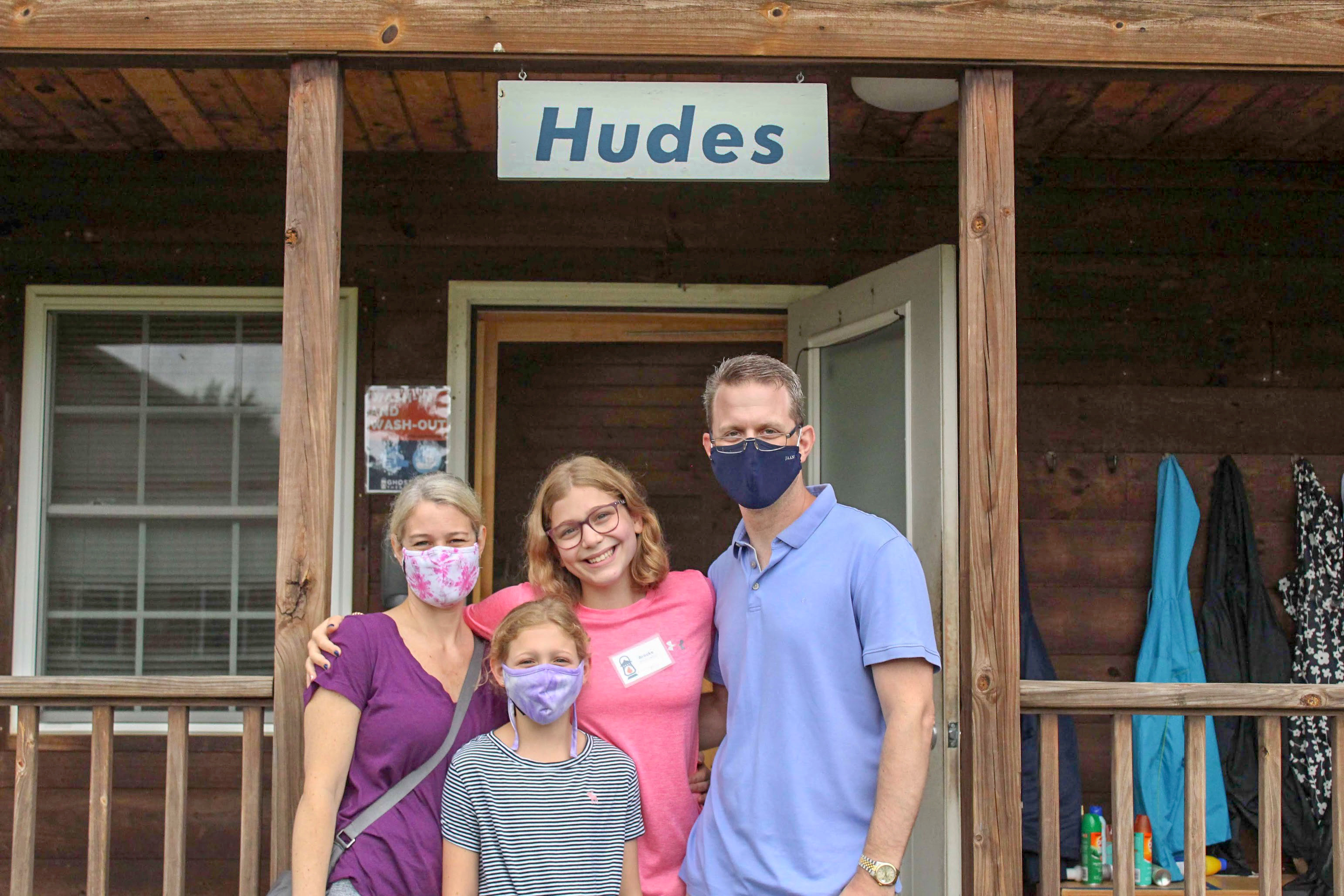 A family at camp on arrival day